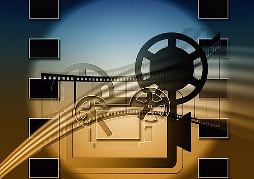 Movie projector and film reels